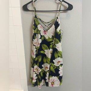 Forever 21 Floral cross neck mini dress. Super flattering! Zipper back. Size S.